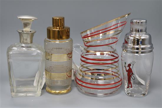A silver-mounted Art Deco decanter, two cocktail shakers and a water jug tallest 24cm